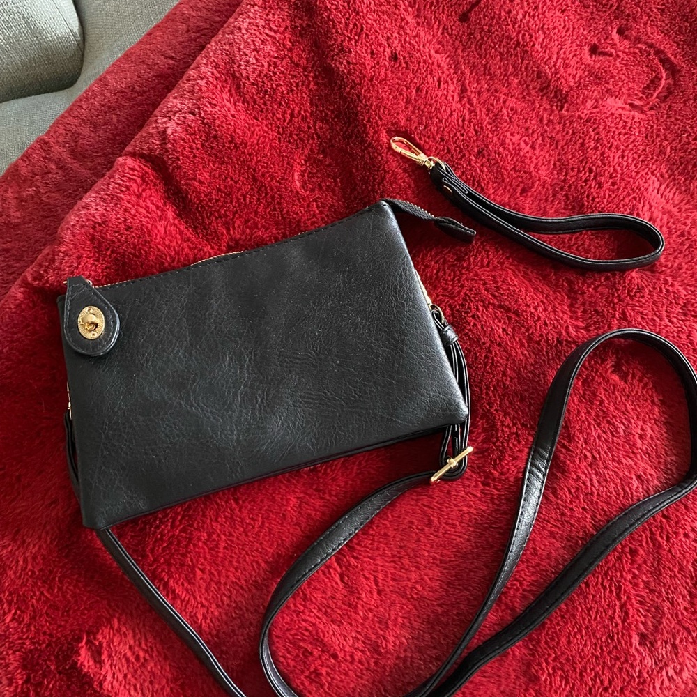 Crossbody black vegan leather purse.  NWOT.  (Gift)